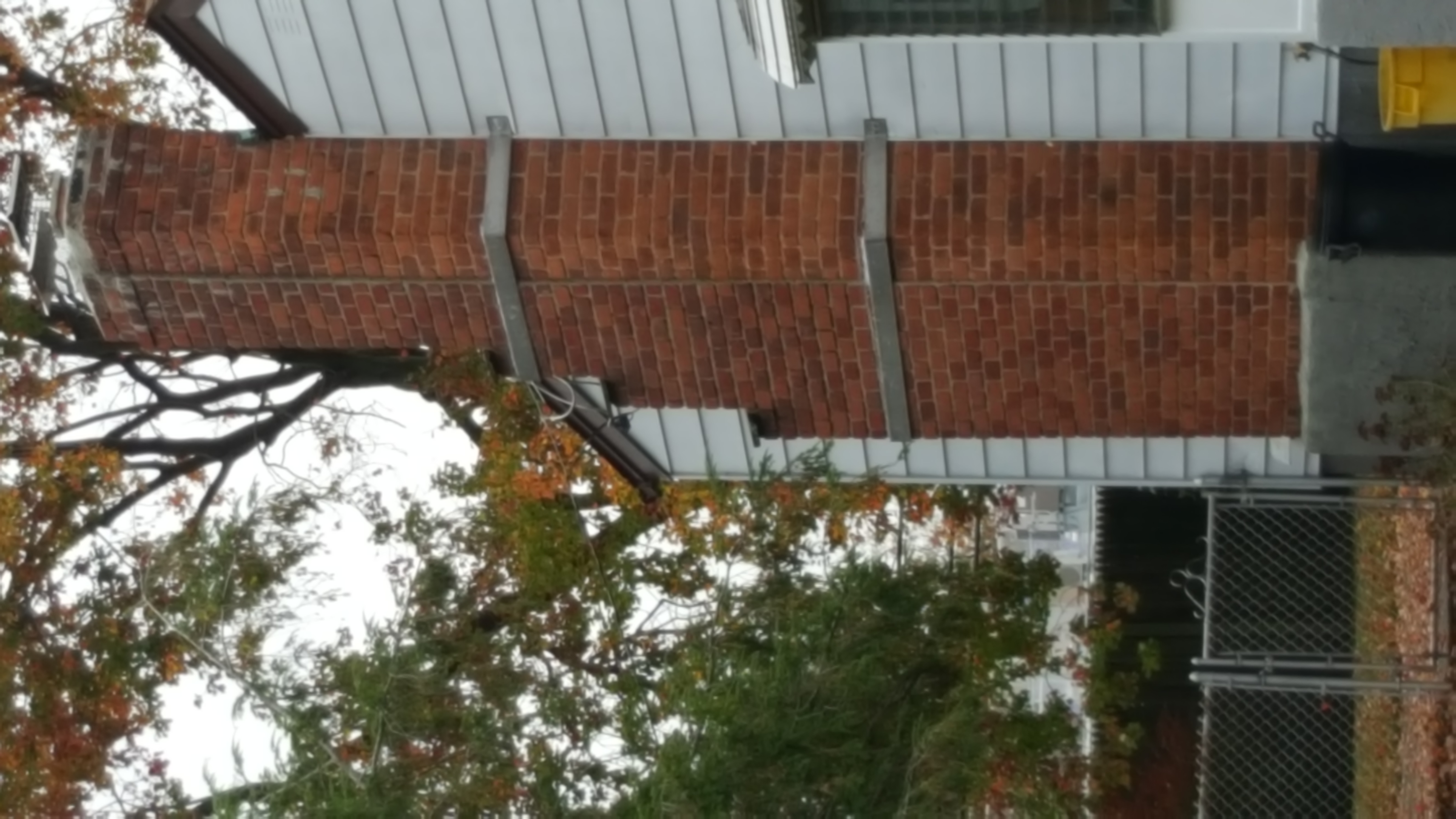 Heavy oil soot removal from chimney flue in Glen Cove, New York